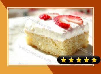 White Sheet Cake With Creamy Topping And Strawberries recipe